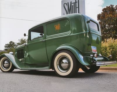 A classic car painted with Smith Drug Company colors